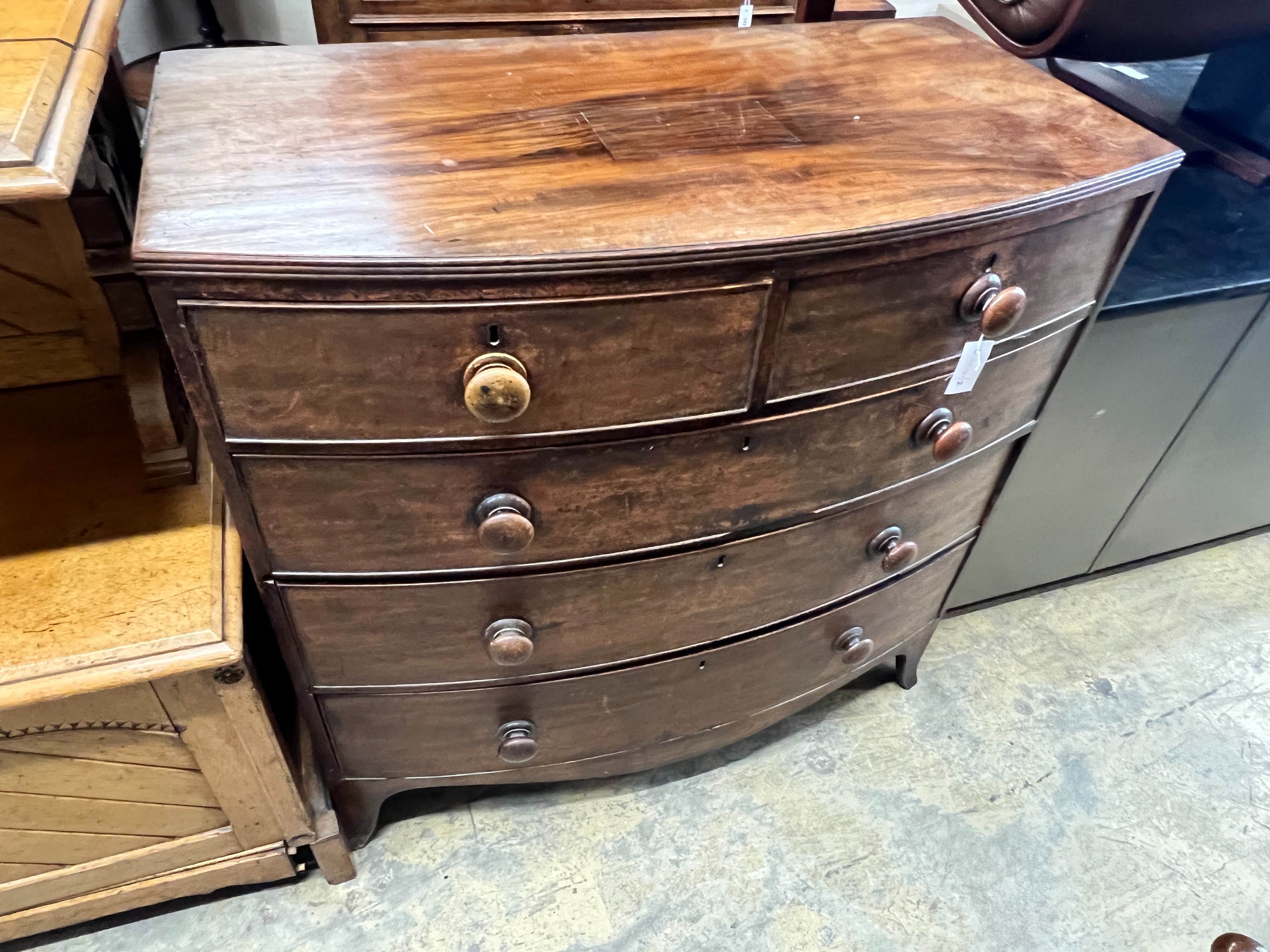A Regency mahogany bow front chest of drawers, width 105cm, depth 55cm, height 103cm